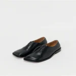 Front view of Hender Scheme Bear Foot Balmoral Leather Shoes in polished natural leather