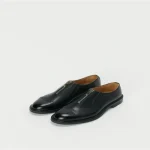 Front view of Hender Scheme Front Fastner Zip-Up Derby Shoes in premium leather