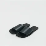Front view of Hender Scheme Minimal House Made leather slide sandals